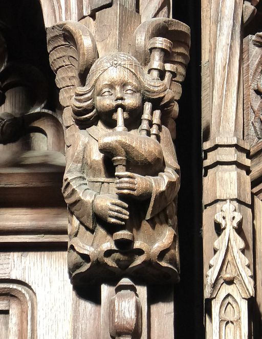 Photograph of a carving of an angel playing bagpipes found at the Thistle Chapel in St Giles Cathedral, Edinburgh.